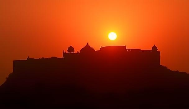 Cinematic shot of Golconda Fort at sunset, used for a historical drama